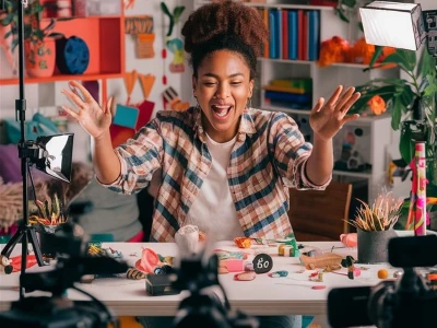 Content creator using AI blur remover to sharpen photos for social media